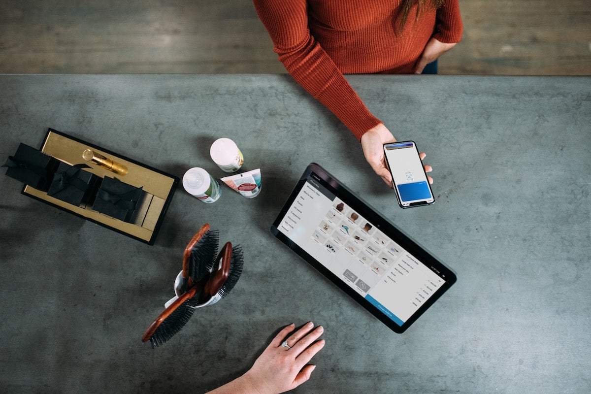 Woman Purchases Products Using Her Cellphone Salsify Digital Brand Identity